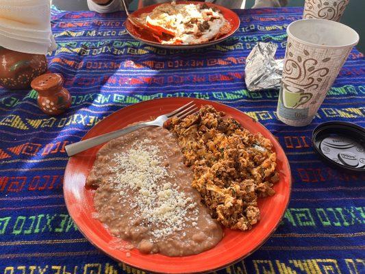 Eggs with chorizo  Chilaquiles with carne azada