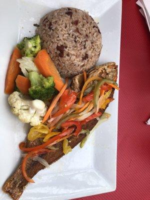 Escovitch fish rice and pease and steamed veggies