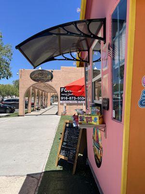 Kona Snow Shack is pet friendly, free pup cup filled with shave ice for your pet .