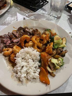 New York Strip Steak, Shrimp, sautéed vegetables and steamed rice