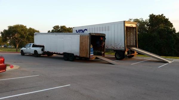 Transferring a shipment from local move onto Semi-trailer. For out of state delivery.