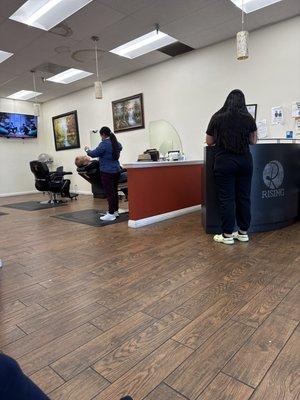 Lady getting eyebrows done