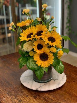 Let the sunshine into someone's heart with our sunflower falls.