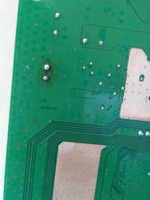 Their solder job on the bottom of the repaired board.