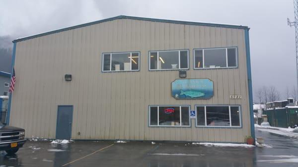 The front of our building where we have parking and a small retail seafood market.