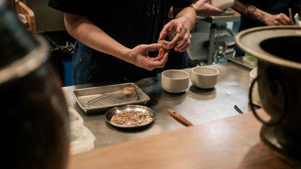 preparing the scallop dish