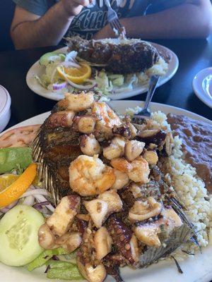 Fried fish, shrimp, octopus w/ rice, beans & salad