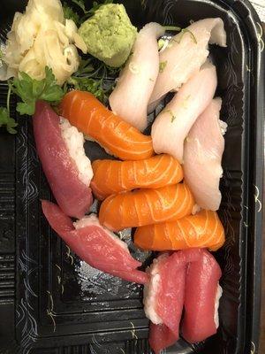 Sorted sushi platter. Looks like worms when delivered. Never seen this kind of service