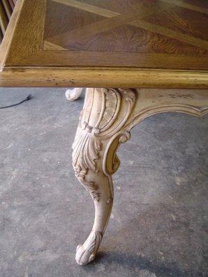 Repaired and refinished scroll work on dining table leg by Better Than New Fine Furniture Repair