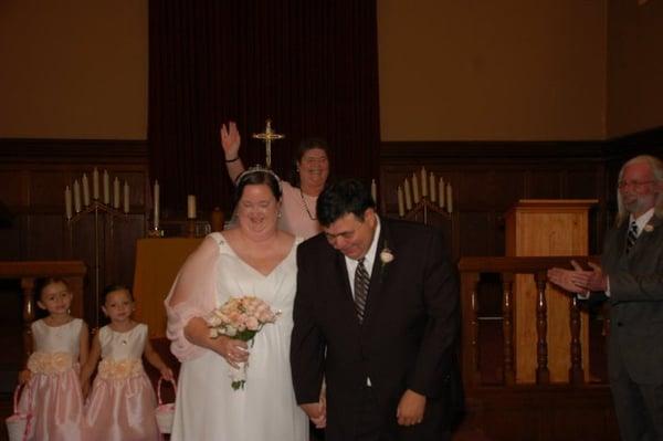 Our wedding in the chapel - the officiant proclaiming:  May they live long and prosper!