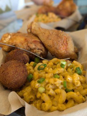 Two piece chicken with side of Mac and cheese