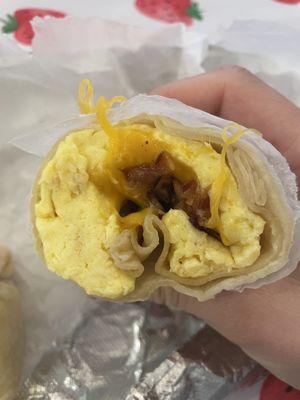 Bacon egg and cheese on a plain wrap