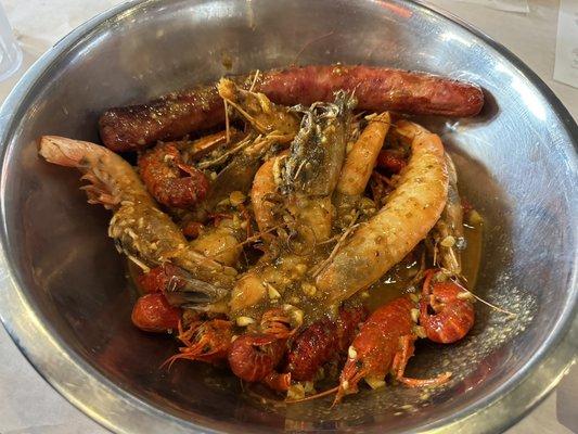 A pound of shrimp with heads, a pound of crawfish, Hmong sausage, with a side of rice (Not Pictured)