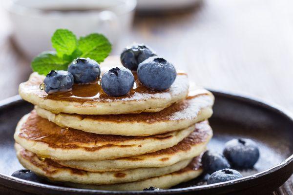 Gluten free paleo pancakes with eggs whites, cinnamon, locally-harvested honey and blueberries