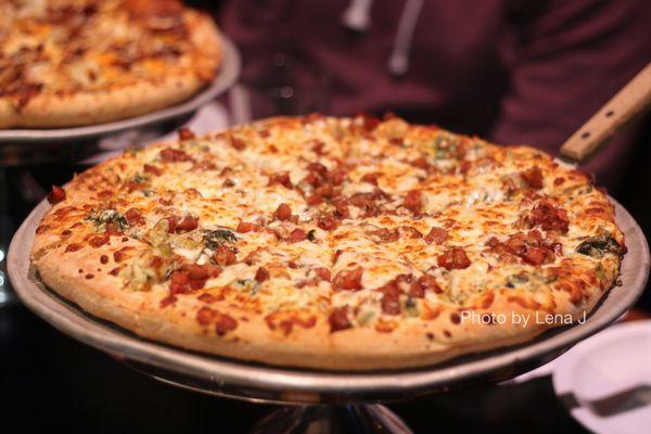 Large Spinach & Artichoke ($40.50) - Fresh spinach, artichoke heart dip, diced tomato bruschetta topped with mozzarella