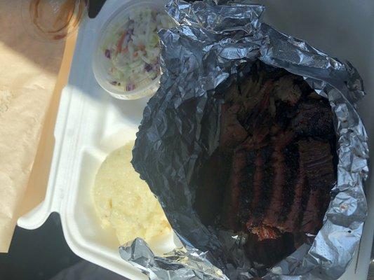 Beef brisket lunch, mashed potatoes and coleslaw. This usually comes with a cookie bar but they ran out this day.