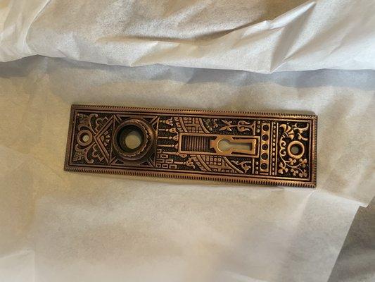 Elaborate Eastlake door plate in antique copper