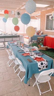 Blue table cloth and cow runner.