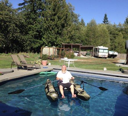 Having a pool in the great Northwest means you can check out a little one man pontoon boat before going in the waters.