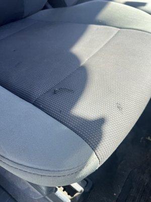 Dirty and hole in passenger seat