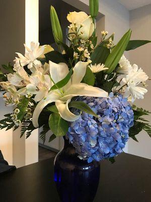 Beautiful in Blue arrangement. $84.13 ($12.95 delivery fee and tax included).