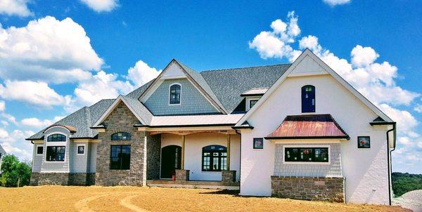 On Top of It Roofing and Construction worked hard on the details of this home, check out the copper work.