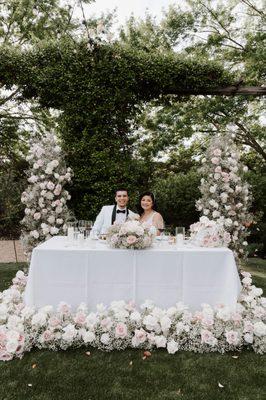 Sweetheart table in the garden grove