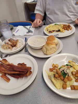 So large split between the two of us. Cowboy omelet with side of biscuits and gravy!!