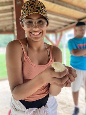 My princess with a baby barn chick