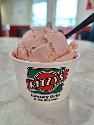 A perfect scoop of Strawberry Ice Cream on a hot summer evening. GET YOUR OWN!