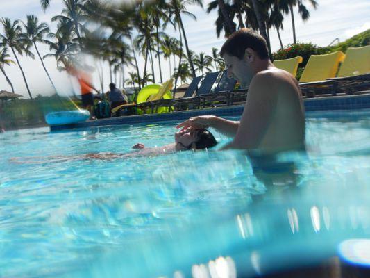 Coach Reed taught our daughter Sophie to swim.