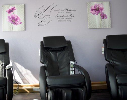 Indulge in a relaxing pedicure with our massage chairs.