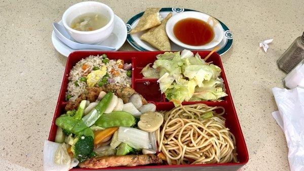 Lunch special. Pick your own entrée. Egg foo yung is hiding under all those vegetables.