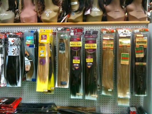 Wig World  selections of Human Hair Extensions of all lengths, colors, and textures