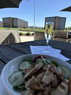 enjoying chicken salad and prosecco on the patio