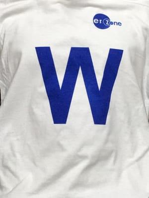 Giving away free Cubs W t-shirts with repairs to help celebrate our cubbies while supplies last! (Some Restrictions apply)