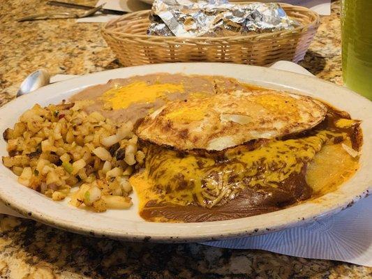 Cheese Enchilada with fried egg beans & rice