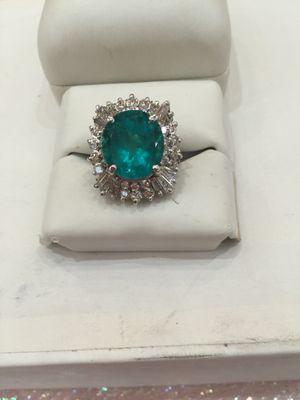 Center 9.80 carats natural Columbia Emerald with side 2.12 carats diamond