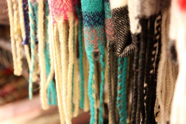 Warm up this season with thick and soft blanket scarves, shawls, and wool!