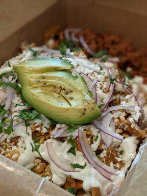 Chilaquiles with chorizo - love the refried beans