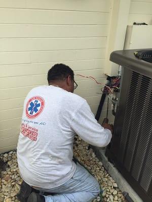 Carlos finishing up condensing unit