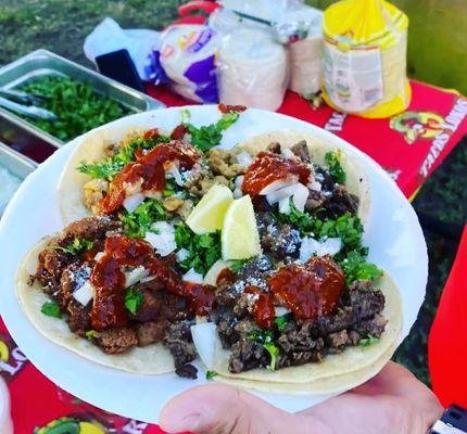 Carne Asada Tacos, and chicken   tacos. Both  red are green Salsa are on point.