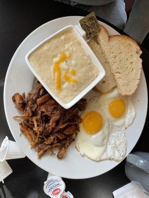 Pulled pork, grits, sunny side up eggs, Texas toast