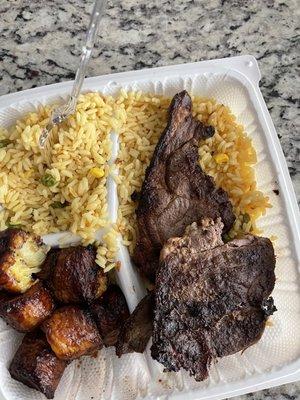 Lamb chops, yellow rice, and plantains