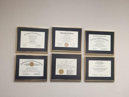 All his diplomas - he was on the Deans List