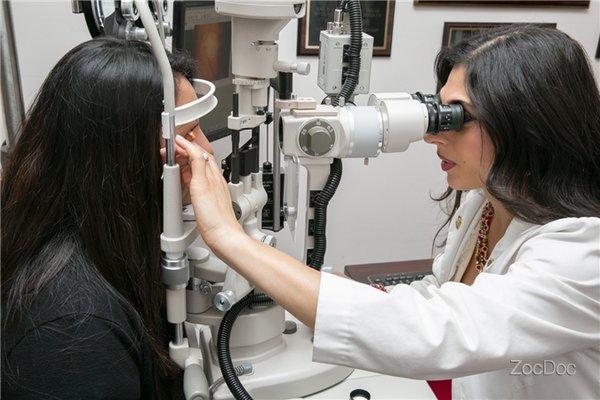 Dr. Golie examining a patient.