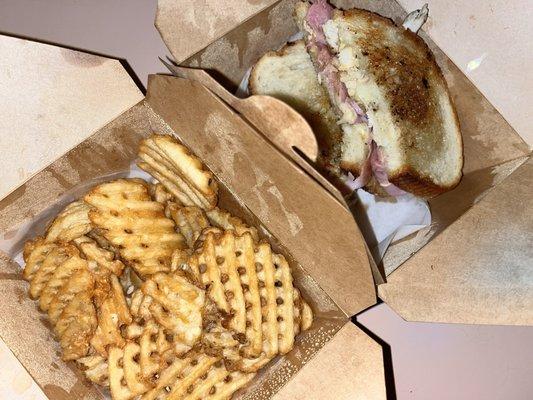 Cordon blue sandwich and waffle fries