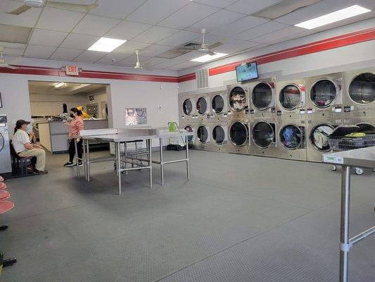 Inside laundromat.