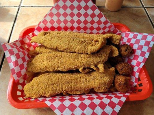 Fried Catfish Filets with fries and Hushpuppies