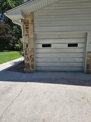 Exterior of old gray junk aluminum door